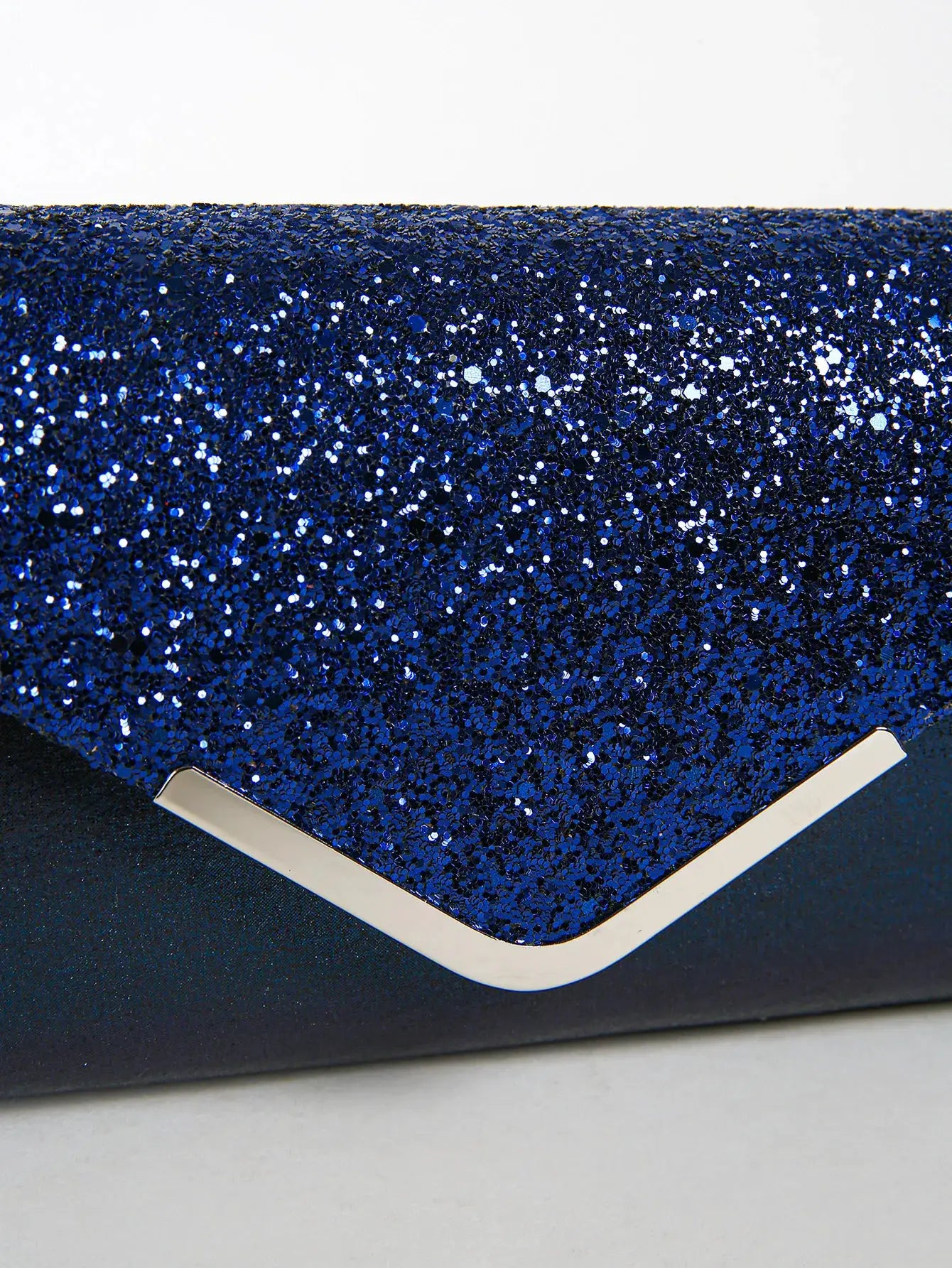Simples Market blue sequined envelope clutch bag with a gold-tone metal frame