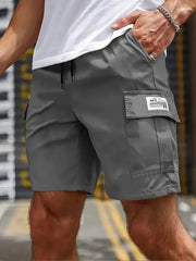 Men's grey cargo shorts with large side pocket; drawstring waist, knee-length, casual workwear by Simples Market.