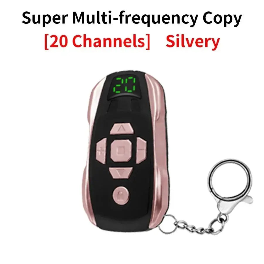 20-channel rechargeable key duplicator remote with digital display, black with pink accents and a keyring