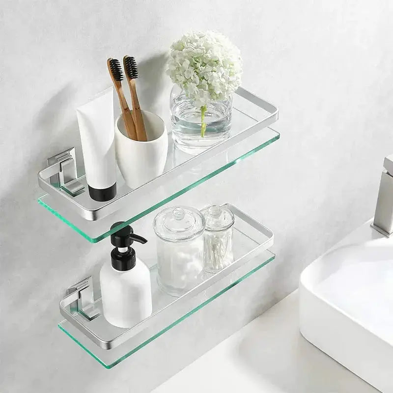 Two-tier glass bathroom shelf organizer with chrome brackets mounted on wall