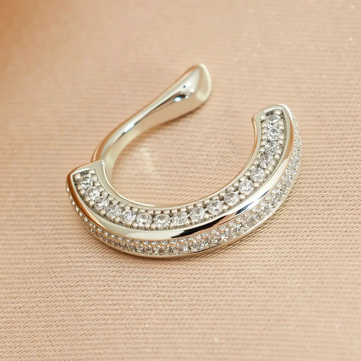 Delicate zircon clip-on ear cuff, silver-tone crescent encrusted with clear stones