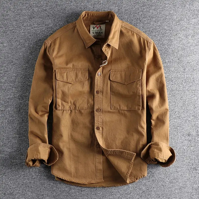 Khaki men's work shirt with twin chest pockets, button-front, rolled cuffs, V-Man label