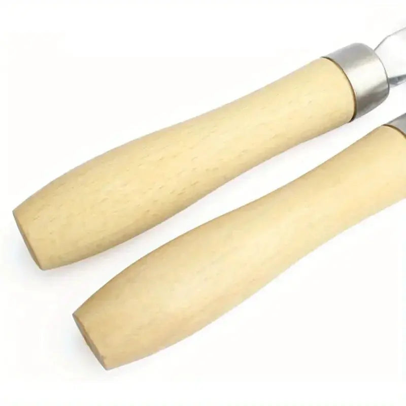 Two wooden-handled tire repair rollers with metal collars.