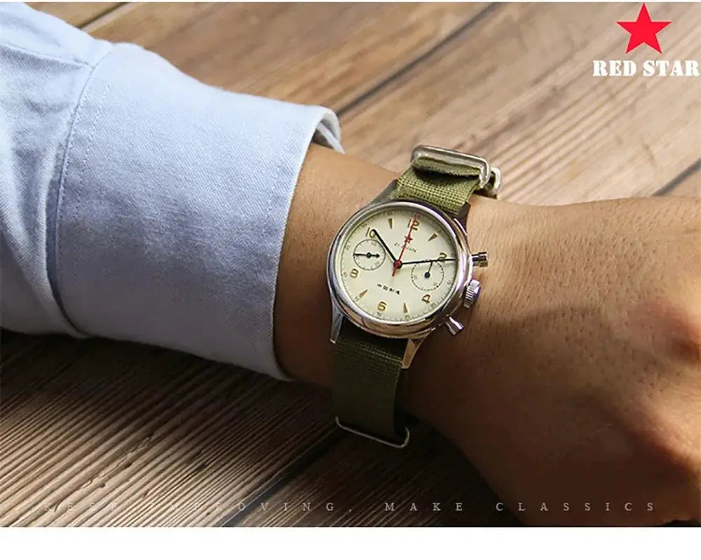 Red Star pilot chronograph watch on an olive green NATO strap with cream dial and two subdials.