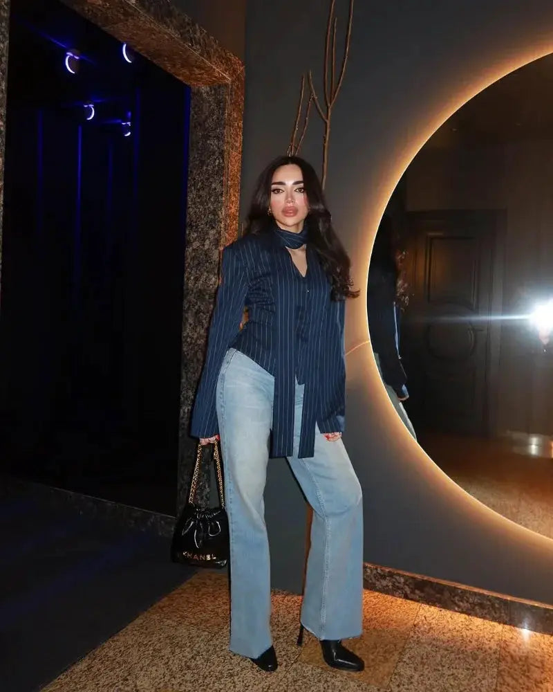 Trendix Elegant Blazer 2 Piece Set in navy pinstripe worn with light jeans and black heels; Chanel bag visible.