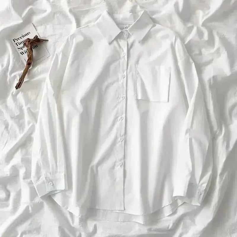 White Japanese-style oversized long-sleeve shirt with chest pocket and turn-down collar