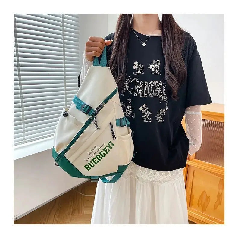 Nylon crossbody bag, cream with teal straps and BURERGY branding