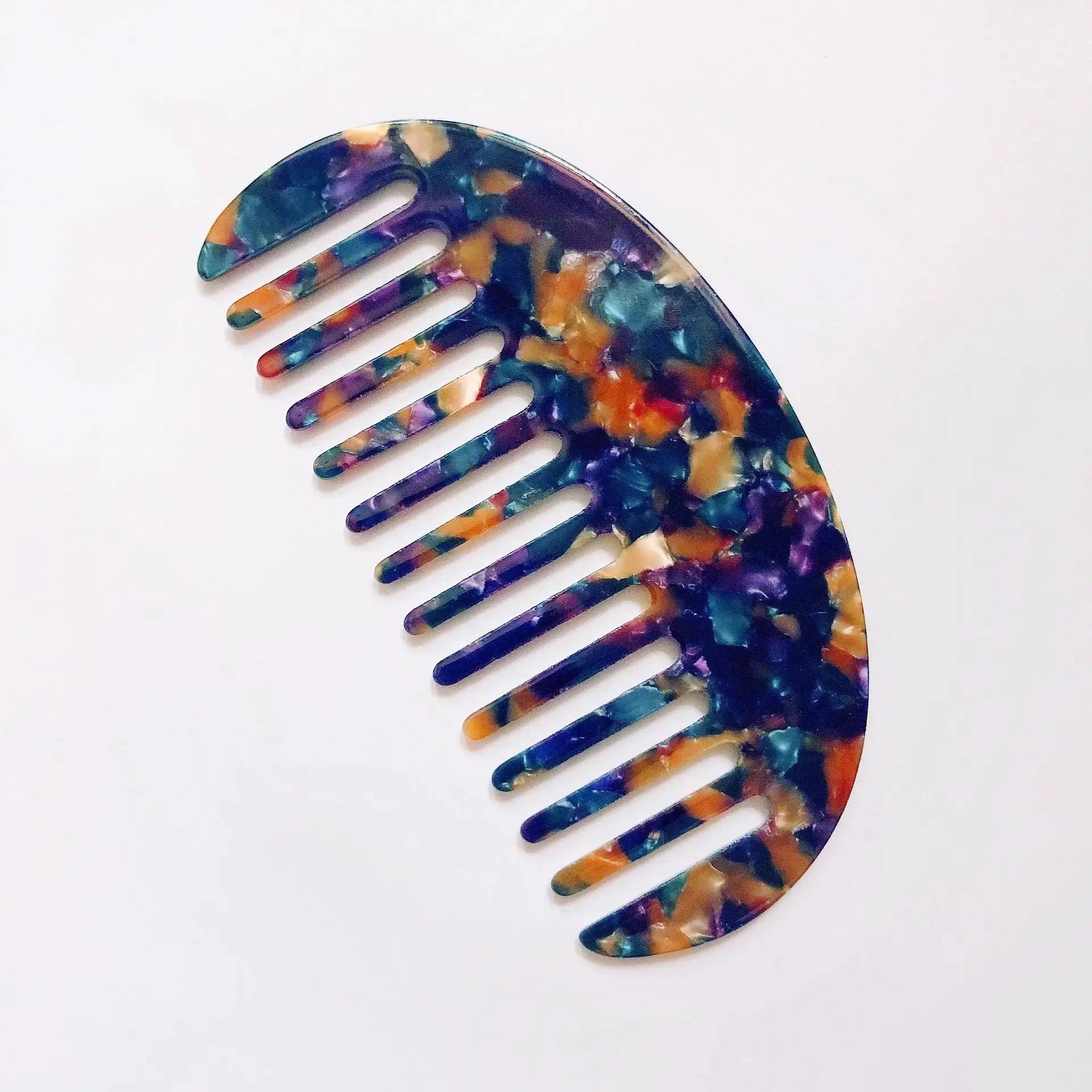Wide-teeth acetate anti-static hair comb by Simples Market featuring a colorful mosaic pattern