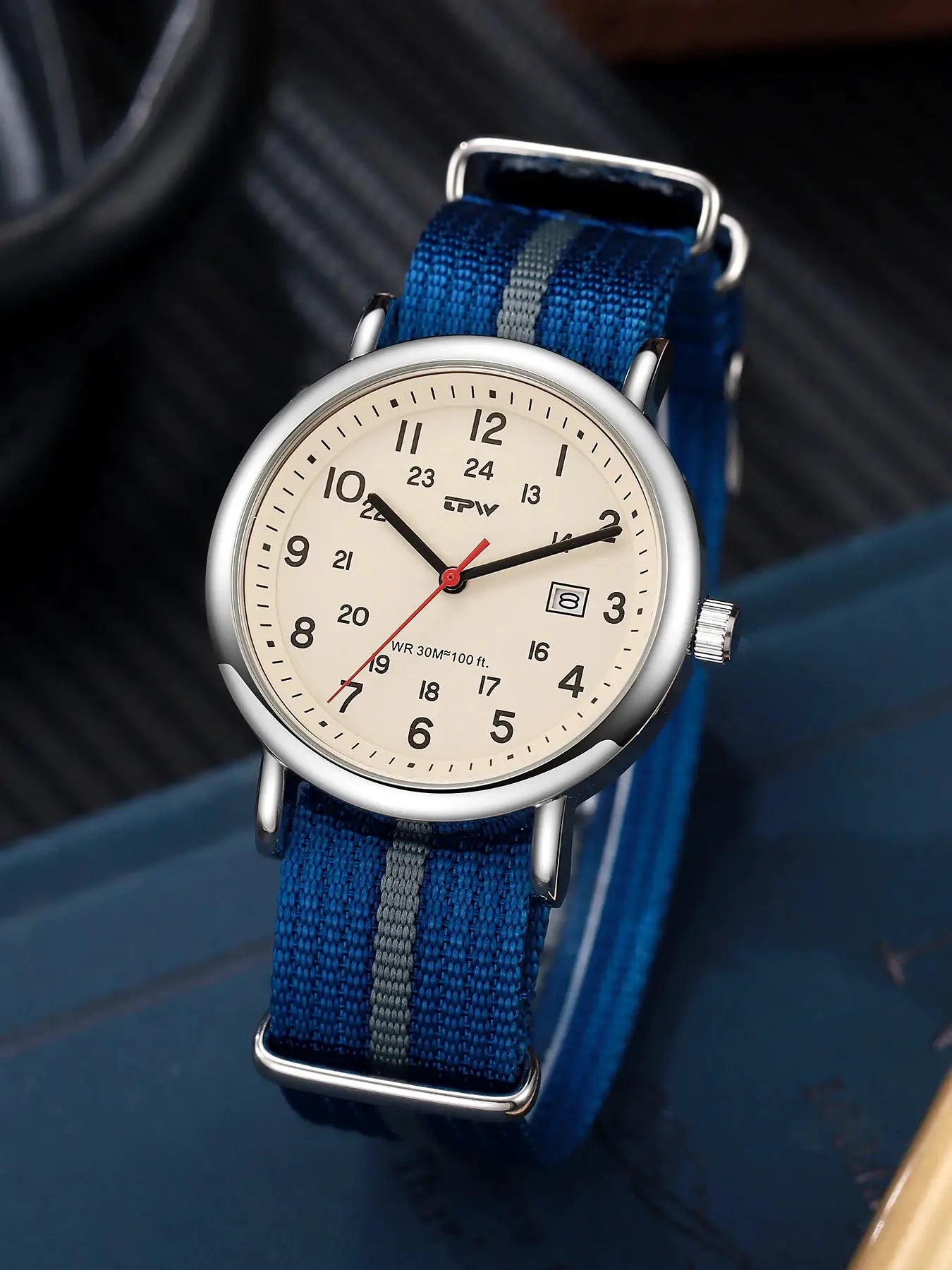 Simples Market field watch with blue fabric strap, beige 24-hour dial and date window