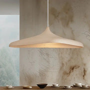 Japanese Wabi Sabi style LED pendant light by Simples Market, beige ceramic shade with warm glow.