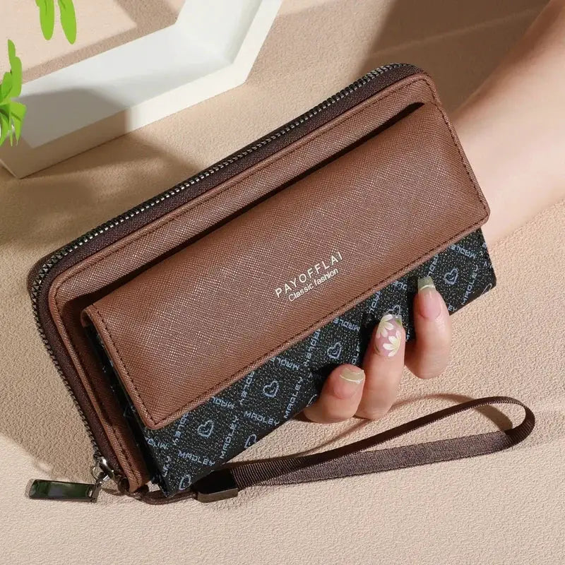 Brown faux leather color-block wallet with double-layer design, snap closure, zippered card holder and photo compartment.