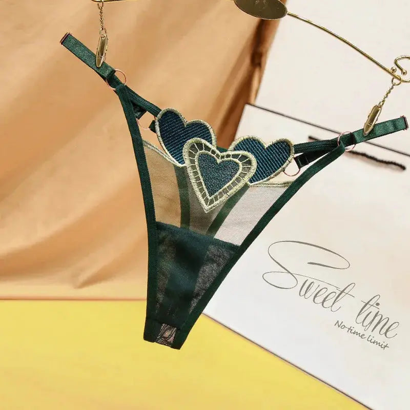 Women's thong underwear by Simples Market, green mesh with heart lace applique, low-rise breathable.