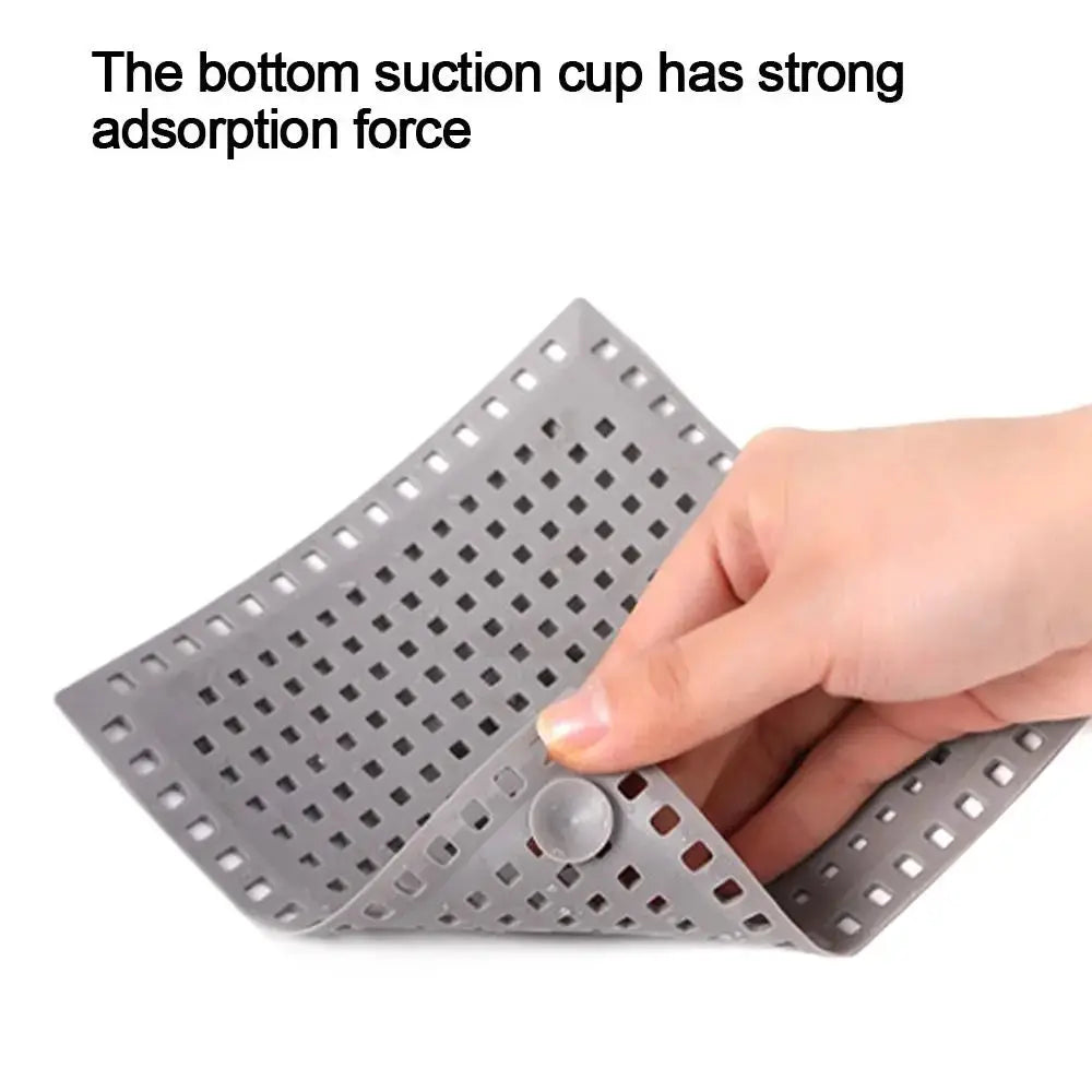 Kitchen sink strainer pad, gray silicone with square perforations for anti-clogging drainage