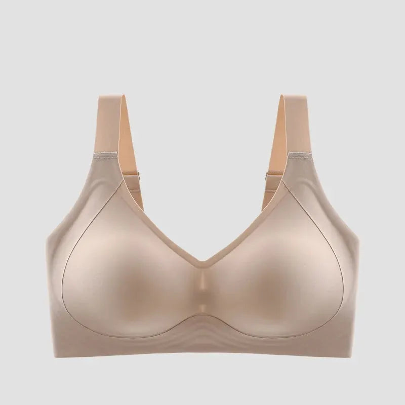 Plus-size wireless sleeping bra in beige; soft molded cups and wide straps for comfort, 6XL.