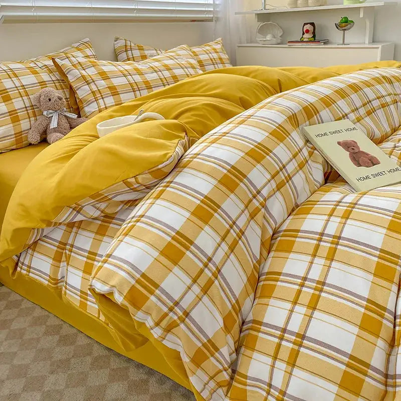 Nordic plaid cotton bedding set with duvet cover, pillowcases, and bed sheets in yellow plaid by Simples Market