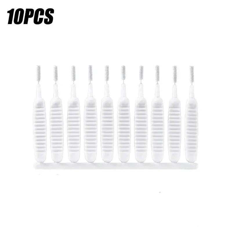 Set of 10 white nylon shower cleaning brushes with ribbed plastic handles