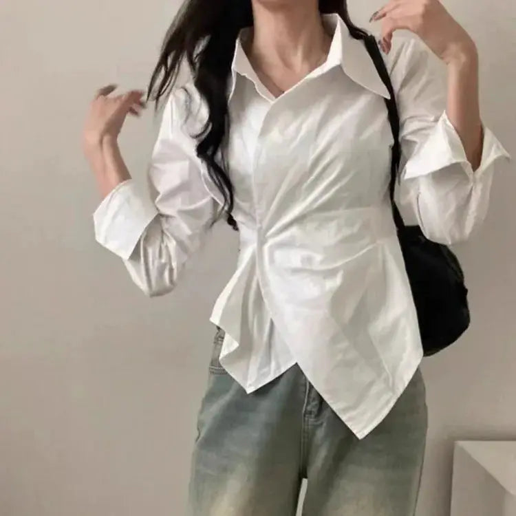Women's white long-sleeve blouse with wrap peplum waist by Simples Market