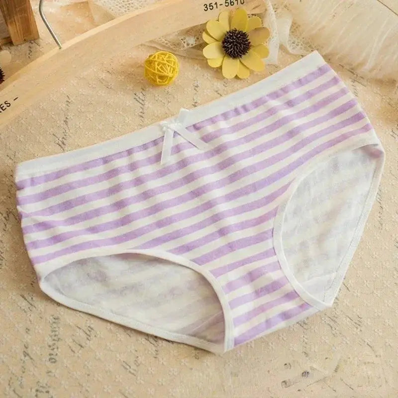 Girls striped panties by Simples Market with lavender and white stripes and a bow