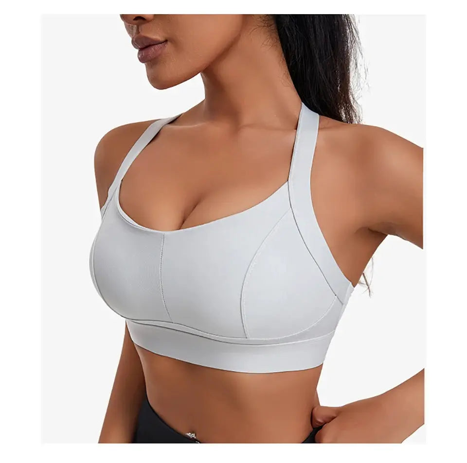 Simples Market women's high-impact sports bra with padded cups in light gray, criss-cross back.