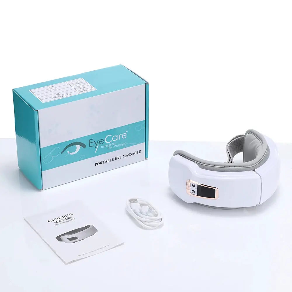 Foldable Eye Air Pressure Massager by Simples Market, white with Bluetooth; includes box, USB cable, and manual