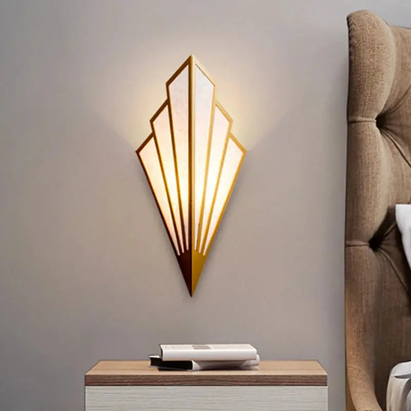 Nordic wall lamp LED iron sconce in gold finish with geometric panels, decorative bedroom lighting.