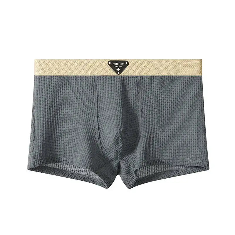 Men's boxer shorts in gray textured fabric with beige elastic waistband and CHUNE logo