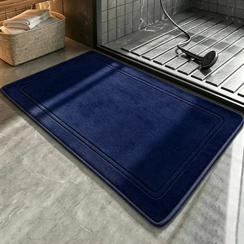 Navy blue bathroom rug with soft plush texture for home decor