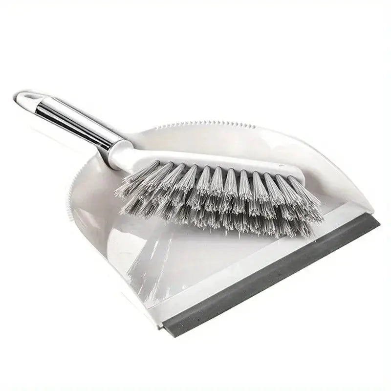 Desk broom and dustpan set by Simples Market; compact plastic dustpan with metal handle and grey bristles