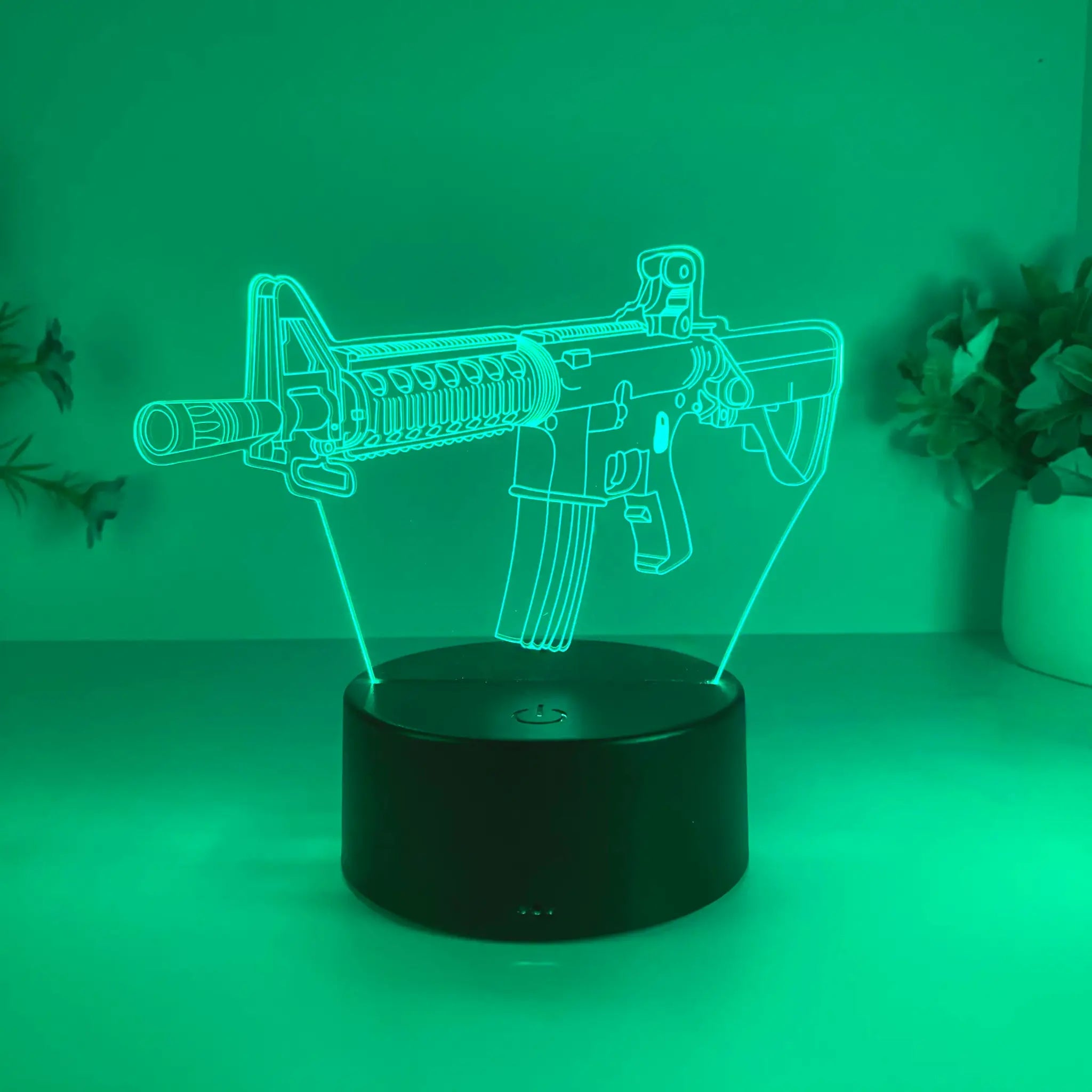 Simples Market submachine gun night light; turquoise LED acrylic lamp with USB base.