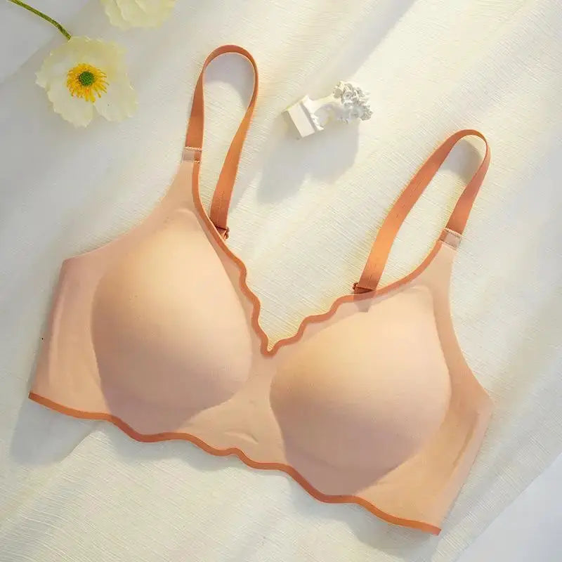 Bra from Simples Market in peach, thin push-up style with scalloped hem and adjustable straps.