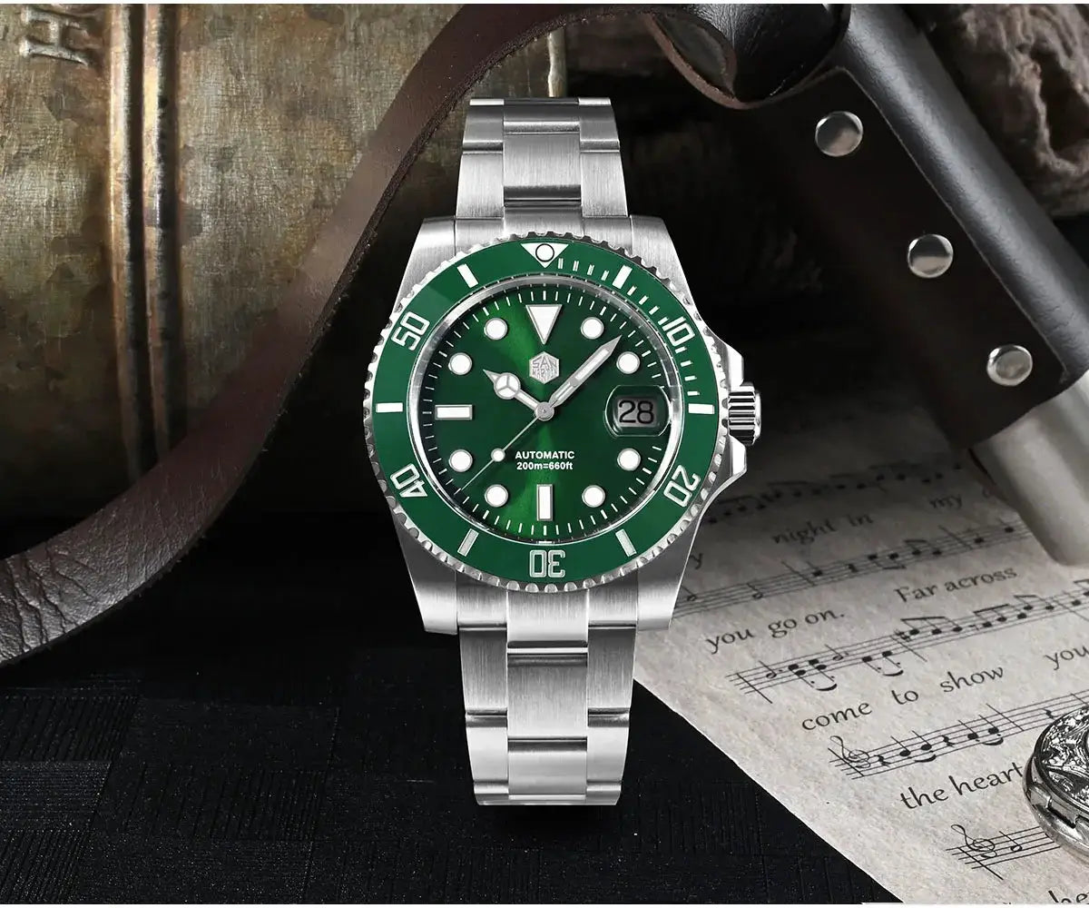 San Martin diver watch with green bezel and dial, stainless steel bracelet, automatic movement, 200m water resistant.