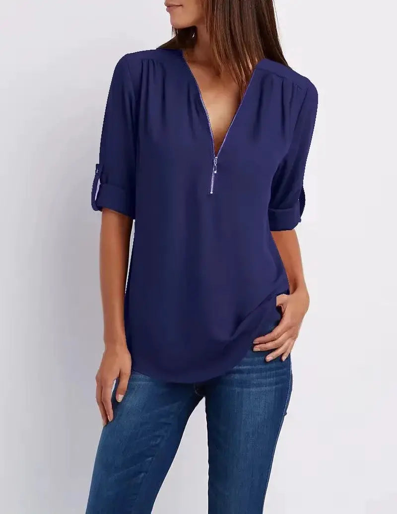 Chiffon blouse in navy blue with a deep V-neck zipper, loose fit and roll-tab sleeves