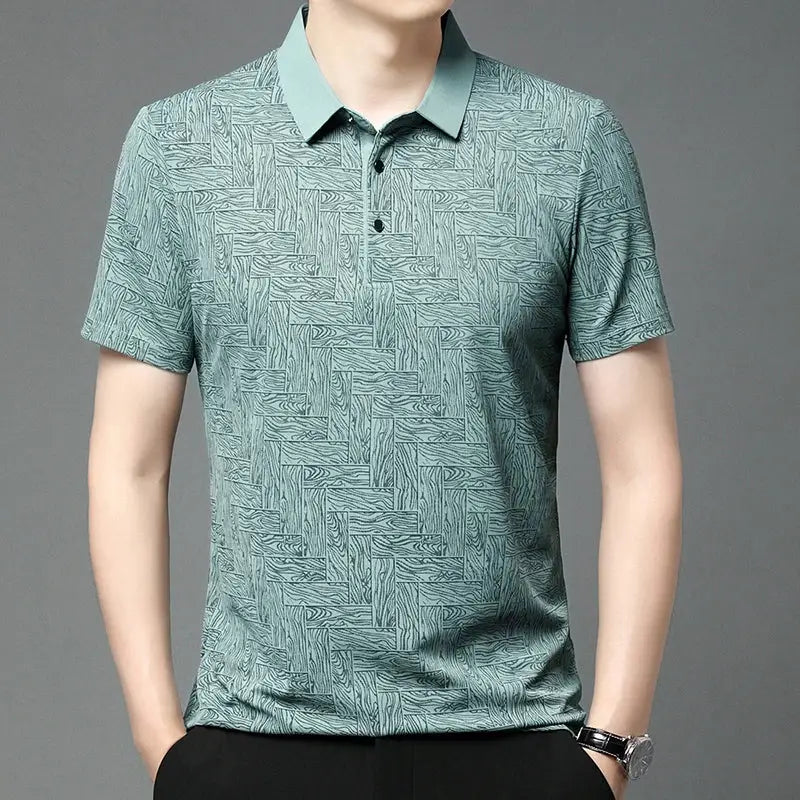 Simples Market men's polo shirt with teal geometric print, short sleeves and polo collar.
