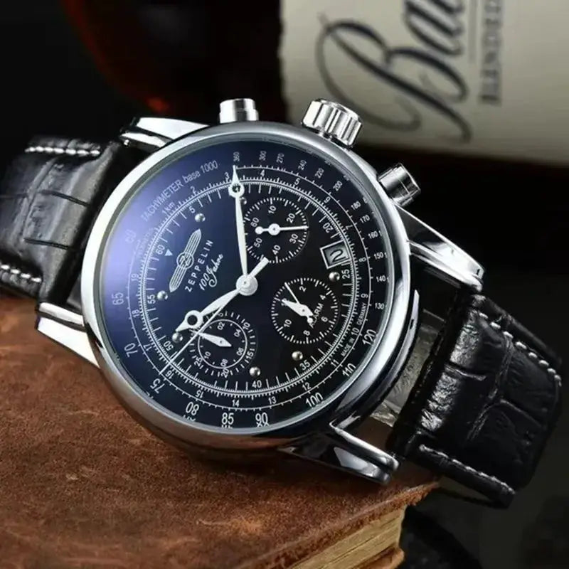 Zeppelin commemorative men's automatic watch with black dial, chronograph, silver case, and black leather strap