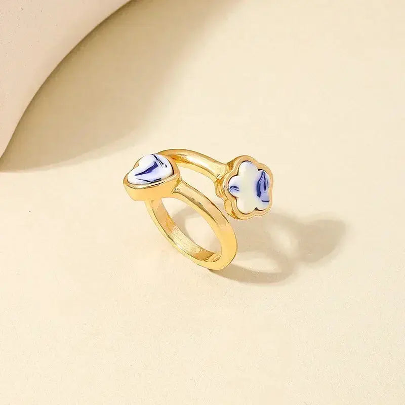 Exaggeration Punk metal ring set, gold-tone with blue-white ceramic inlays, irregular three-layer design, adjustable for women
