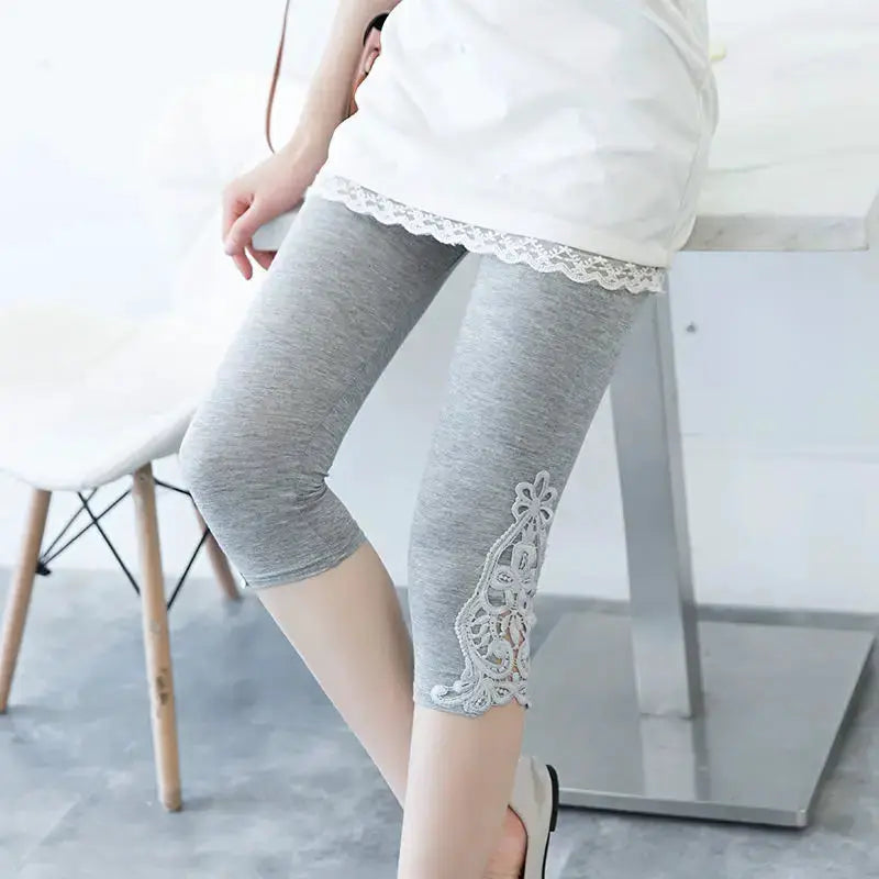 Women's gray modal capri leggings with lace applique on lower leg, 3/4 length