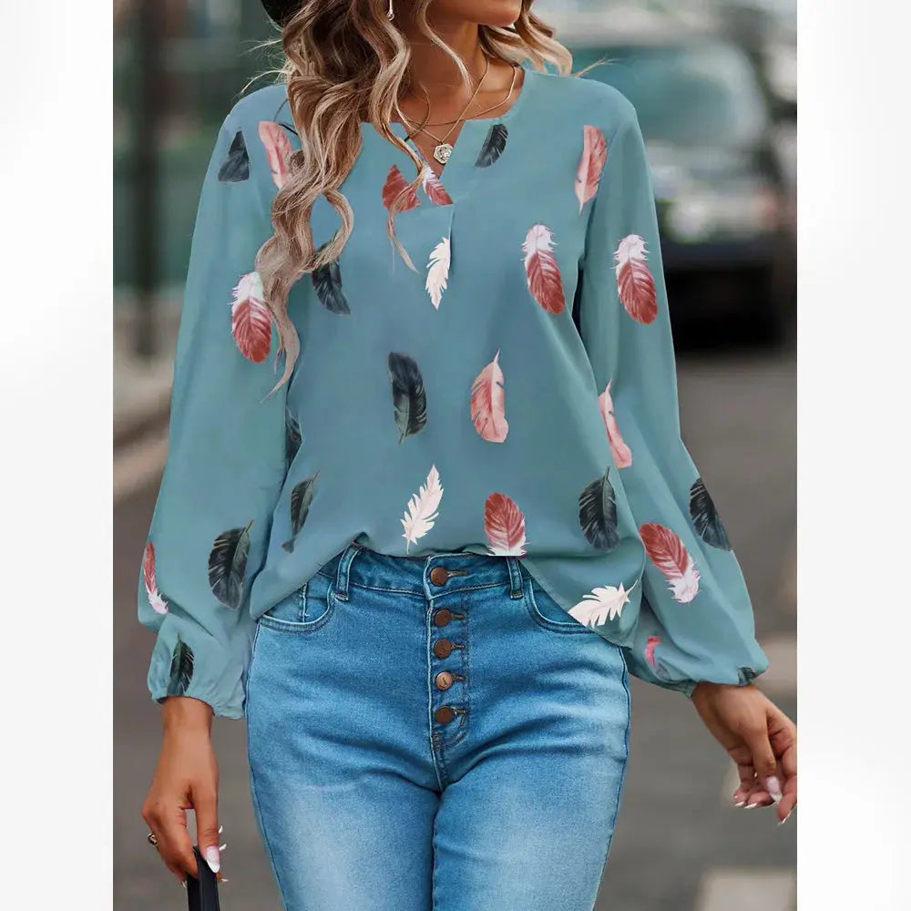 Feather-print teal chiffon blouse for women with long sleeves.