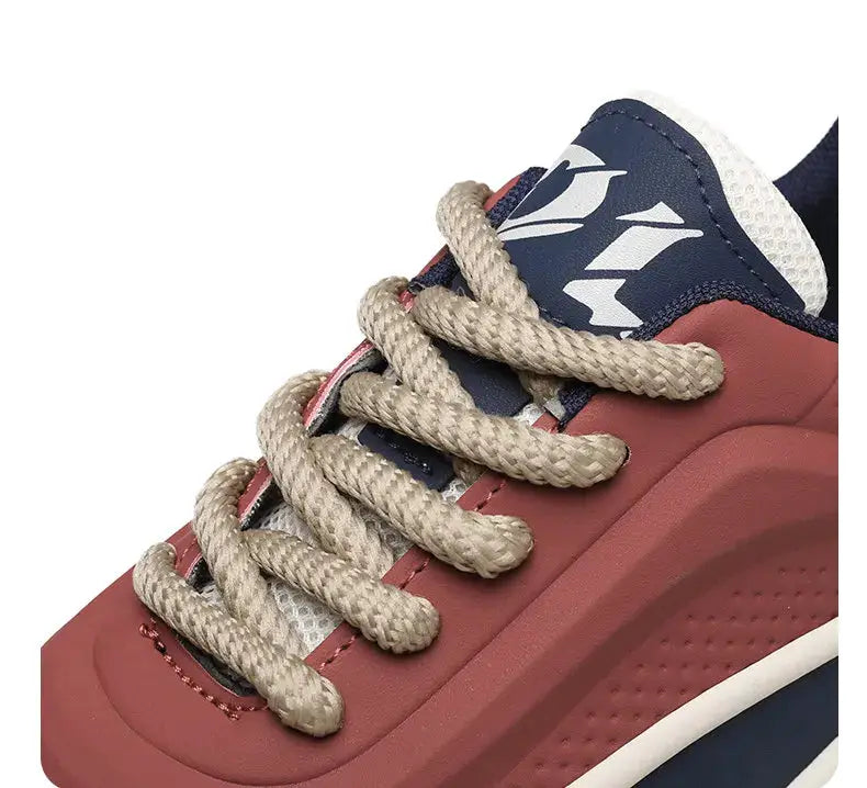 Men's casual sports shoes by Simples Market with thick sole; red upper, navy tongue, beige laces.