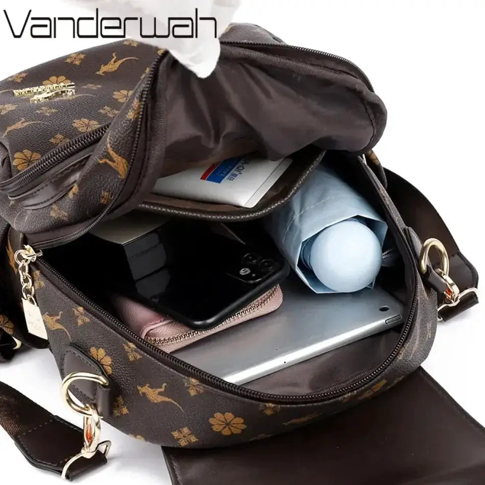Leather ladies backpack Vanderwah with brown floral print, tassel detail, large-capacity interior