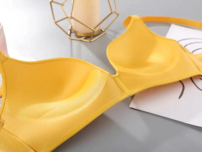 Women's seamless push-up bra in yellow with breathable fabric and padded cups