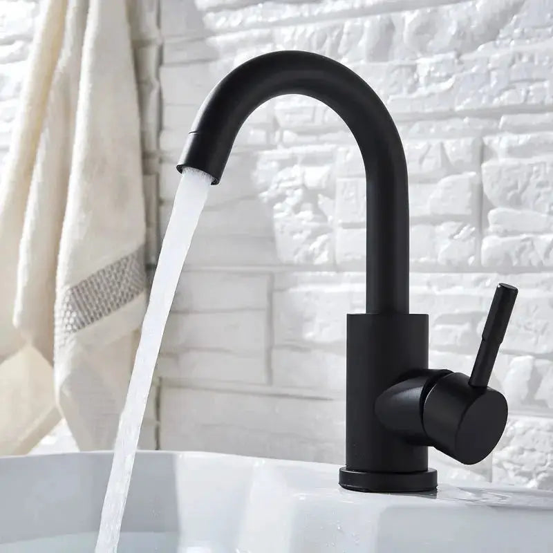 Bathroom basin faucet in black matte finish, 304 stainless steel, single-handle hot/cold mixer, 360° rotation.