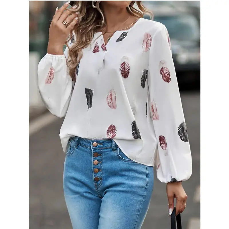 Women's feather-print chiffon blouse with V-neck and long puff sleeves in white