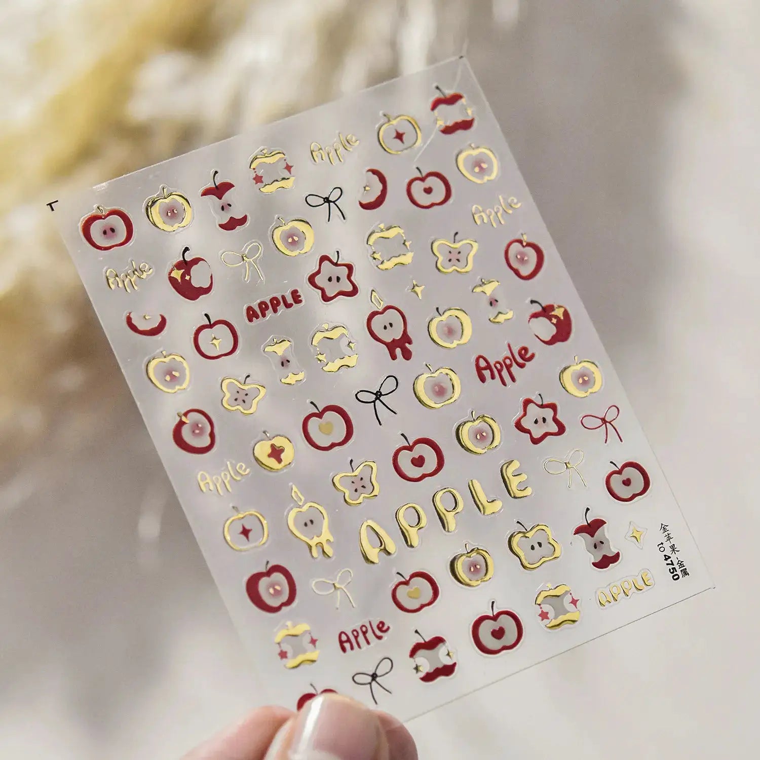 Nail art sticker sheet by Simples Market; pink translucent peach jelly 5D embossed apple decals with gold foil outlines