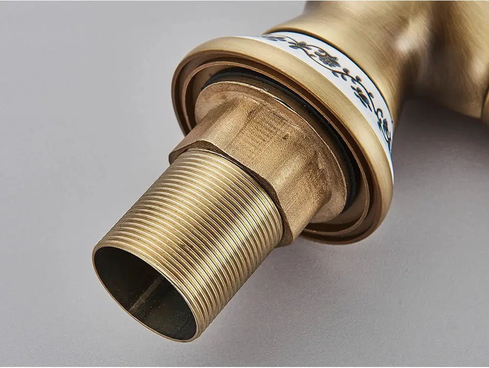 Antique brass bathroom faucet rotating spout with threaded connection