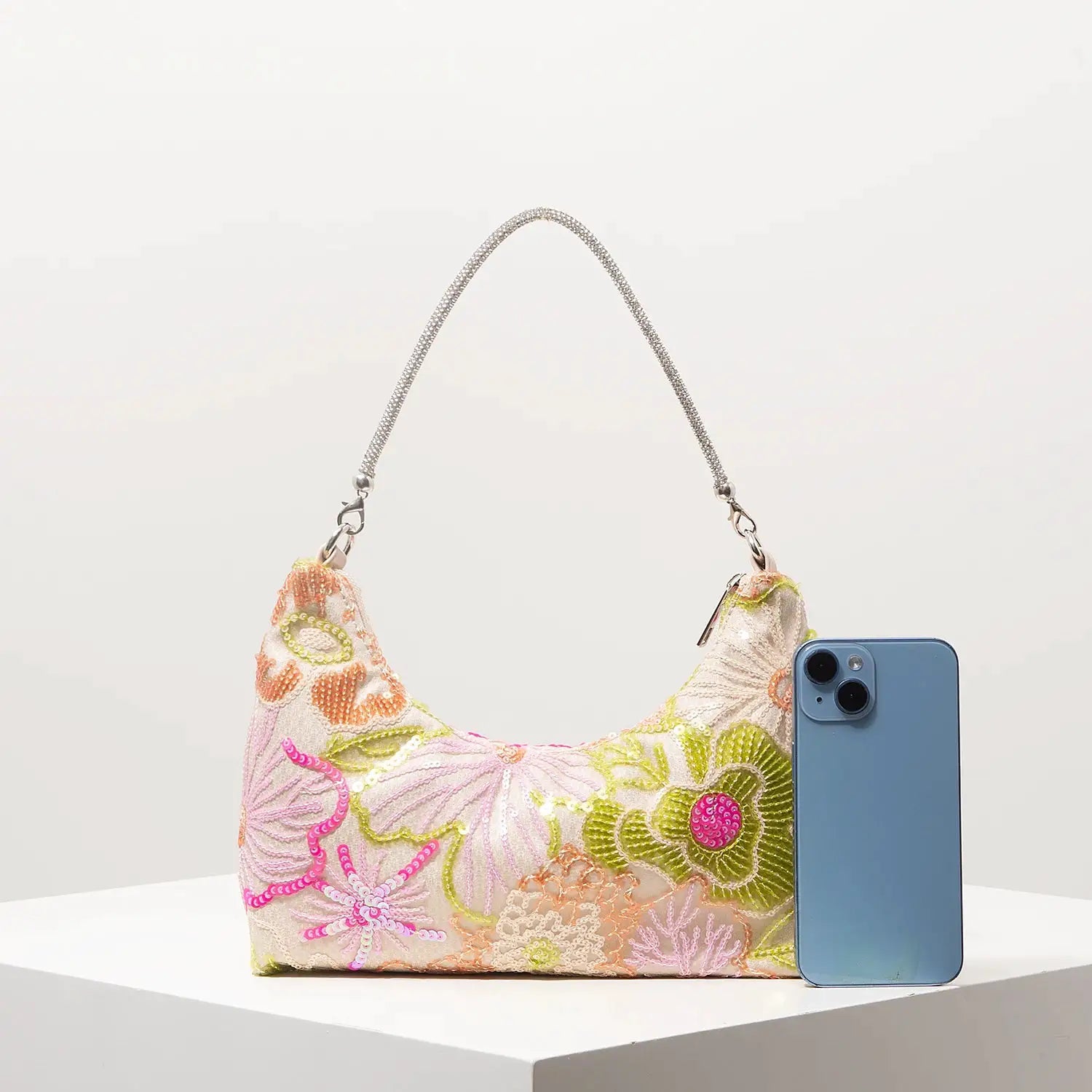 Shoulder bag with colorful floral embroidery and sequin accents, silver chain strap