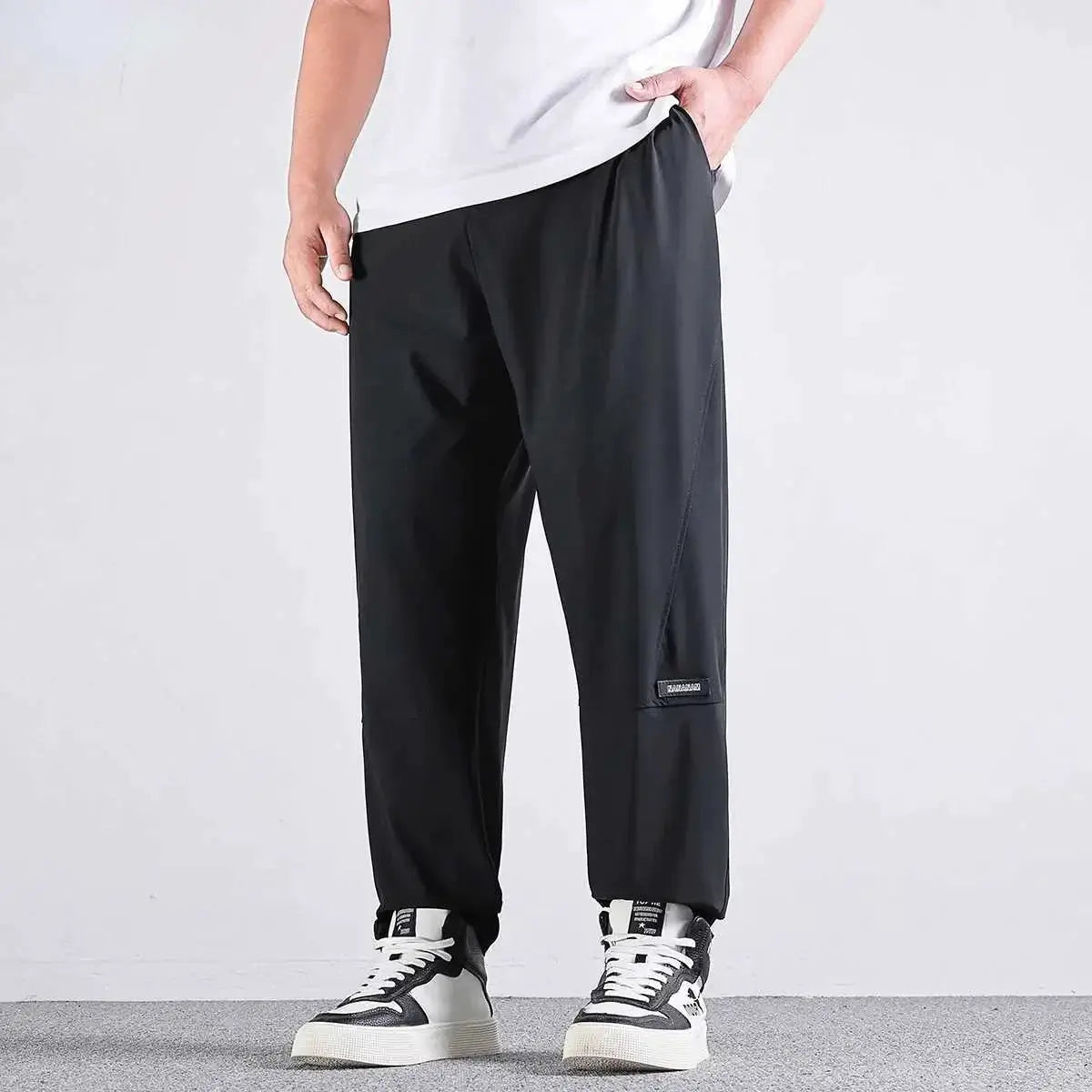 Simples Market men's 10XL black quick-dry casual pants with elastic waist, straight loose fit.