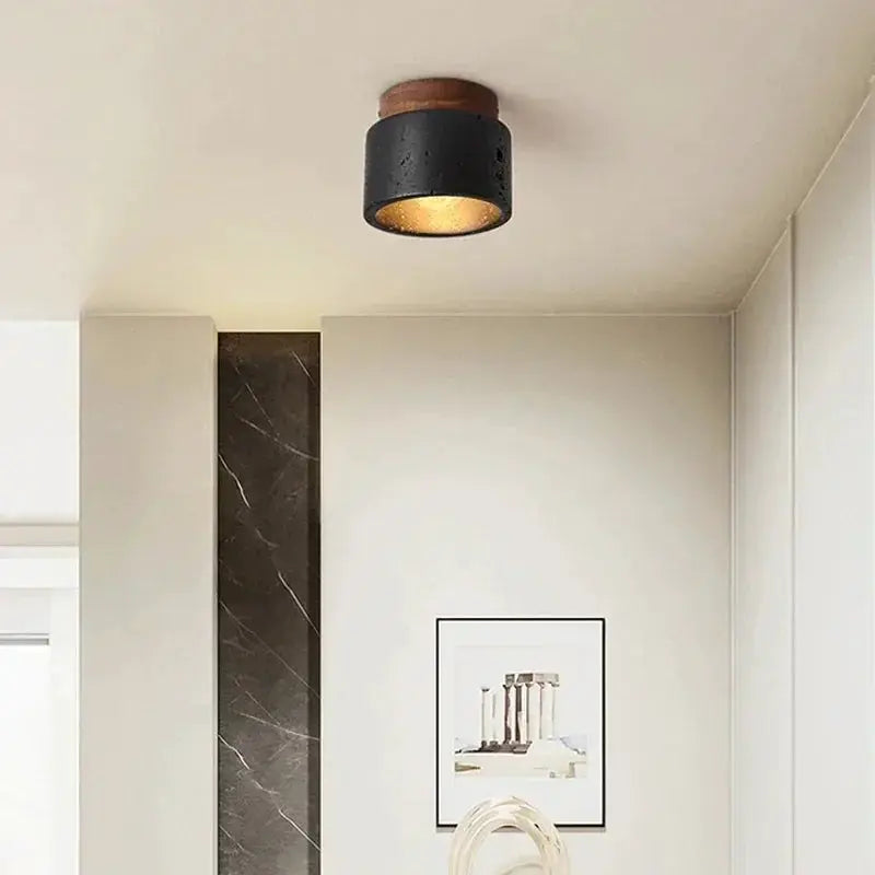 Ceiling lamp black cylindrical fixture with wooden cap and warm gold interior for hallway/corridor