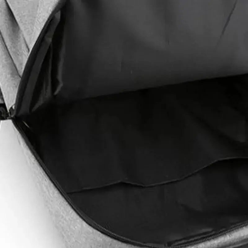 Interior view of a versatile waterproof business laptop backpack showcasing its spacious, waterproof lining.