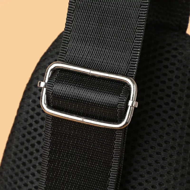 Men's chest bag strap by Simples Market with adjustable metal buckle on black nylon webbing