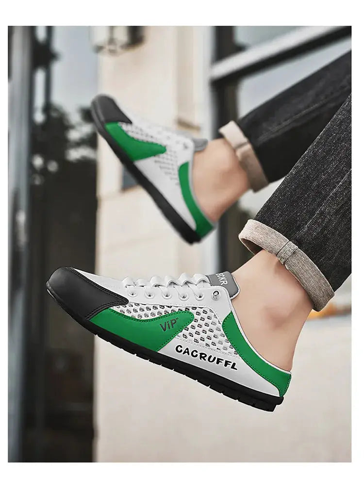 Men's casual slip-on sneakers by Simples Market, white with green panels and black toe, pair shown (2)